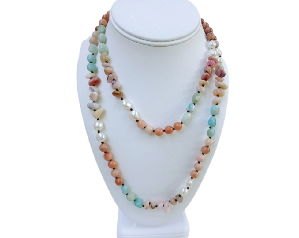 Handmade long necklace featuring natural amazonite and agate gemstones in green and blue hues, designed as a vintage-inspired statement crystal jewelry piece. This unique accessory blends earthy elegance with artisanal craftsmanship, perfect for women who appreciate handcrafted gemstone jewelry. Ideal as a Christmas gift for her, it adds a pop of color and spiritual energy to any outfit, suitable for both casual and formal occasions.