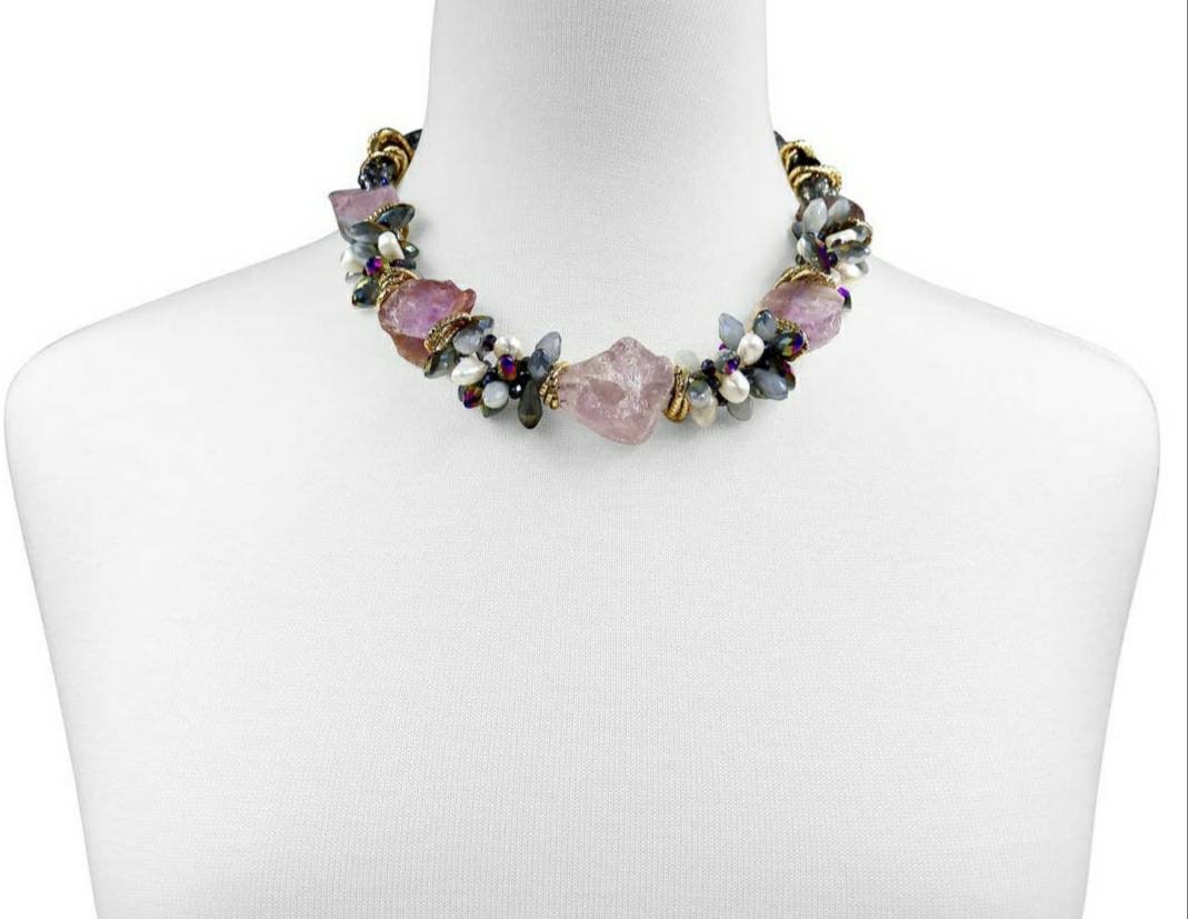 Chunky handmade Amethyst crystal necklace for women featuring raw, natural stones and gold-plated accents for a bold, spiritual statement. This 20-inch boho-style necklace radiates calming purple hues, blending healing energy with modern design. Ideal as a unique gift for her, this artisanal piece supports intuition, protection, and clarity—perfect for crystal lovers and those drawn to nature-inspired, meaningful jewelry.