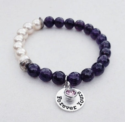 Natural Amethyst Bracelet paired with lustrous freshwater pearls and set on a delicate sterling silver chain. This elegant and inspirational bracelet is perfect as an anniversary gift or meaningful present for women who appreciate handcrafted gemstone jewelry. Combining the calming energy of amethyst with the classic beauty of pearls, it’s a timeless piece that symbolizes peace, love, and wisdom—ideal for special occasions, everyday wear, or thoughtful gifting.