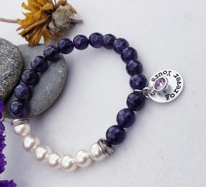Natural Amethyst Bracelet paired with lustrous freshwater pearls and set on a delicate sterling silver chain. This elegant and inspirational bracelet is perfect as an anniversary gift or meaningful present for women who appreciate handcrafted gemstone jewelry. Combining the calming energy of amethyst with the classic beauty of pearls, it’s a timeless piece that symbolizes peace, love, and wisdom—ideal for special occasions, everyday wear, or thoughtful gifting.