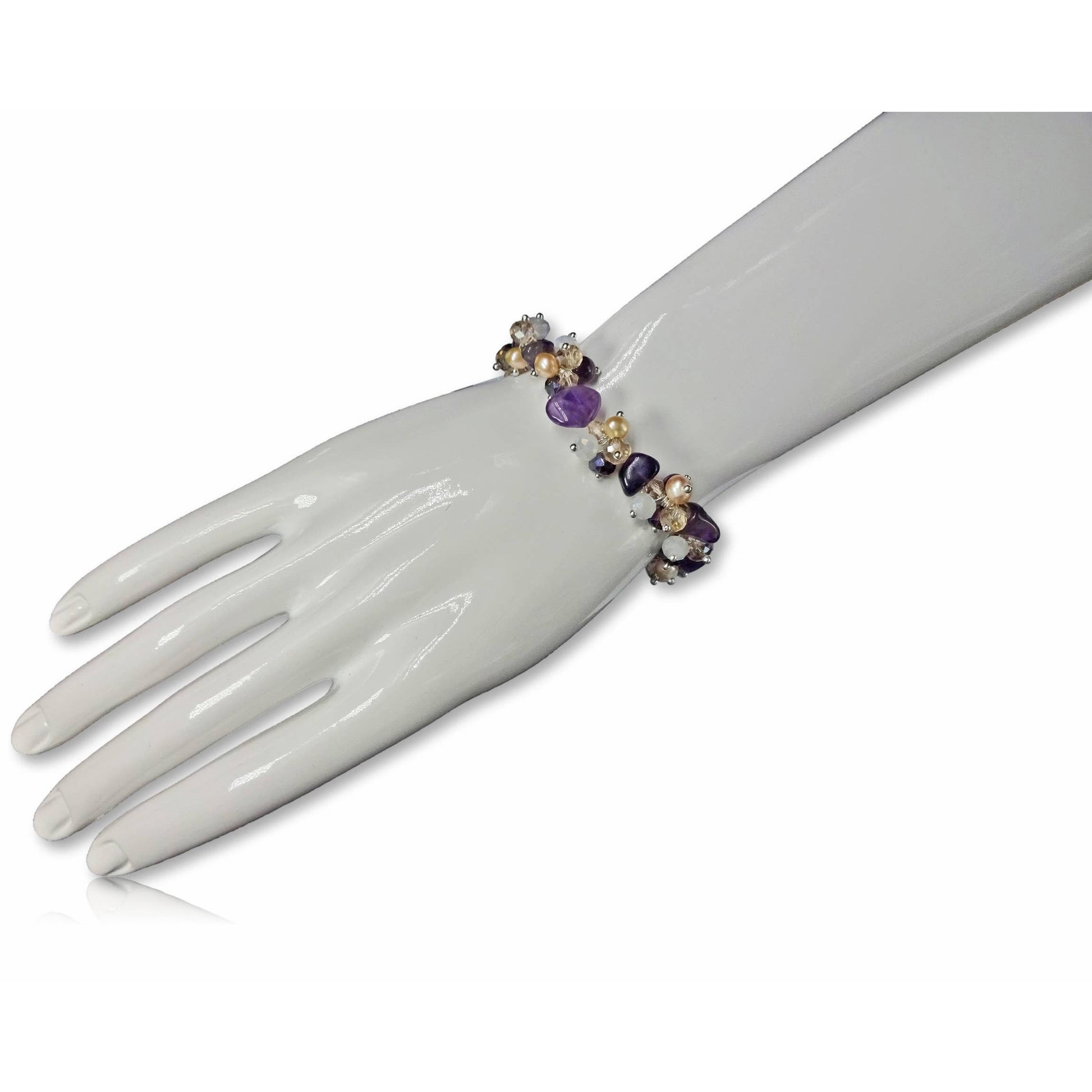 Amethyst Pearl Multi-Stone Stretch Bracelet featuring natural crystal beads designed for style and healing. This chakra bracelet includes amethyst, freshwater pearls, and complementary gemstones to promote balance, clarity, and calm energy. Perfect for those who love natural stone jewelry with spiritual meaning, this handcrafted beaded bracelet is a beautiful accessory for yoga, meditation, or everyday wear—combining elegance, wellness, and boho-inspired charm.