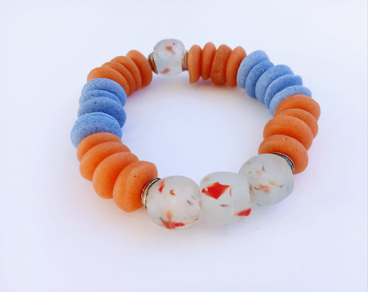 Orange and Blue Ashanti Glass Beaded Bracelet featuring multicolor handmade beads crafted into a vibrant healing jewelry piece for men and women. This lucky charm bracelet blends traditional Ashanti craftsmanship with modern style, promoting positive energy and spiritual balance. Lightweight and durable, it makes a meaningful gift for him or her, perfect for everyday wear or special occasions, combining artisanal quality with bold, colorful design.