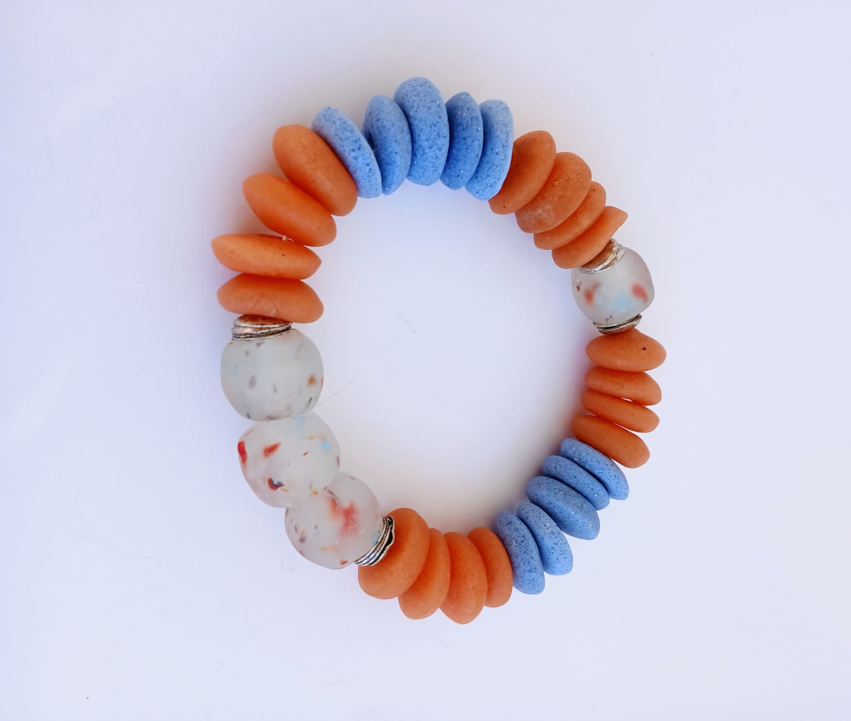 Orange and Blue Ashanti Glass Beaded Bracelet featuring multicolor handmade beads crafted into a vibrant healing jewelry piece for men and women. This lucky charm bracelet blends traditional Ashanti craftsmanship with modern style, promoting positive energy and spiritual balance. Lightweight and durable, it makes a meaningful gift for him or her, perfect for everyday wear or special occasions, combining artisanal quality with bold, colorful design.