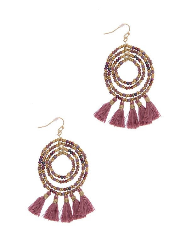 Beaded Hoop Tassel Earrings for women featuring large, handmade designs with intricate beadwork and flowing tassels. These unique boho statement earrings combine vibrant colors and textures, perfect for adding bold flair to any outfit. Lightweight and eye-catching, they make an ideal gift for women who love artisanal, handcrafted jewelry. Perfect for festivals, casual wear, or special occasions, these earrings showcase creativity and free-spirited style in a striking accessory.
