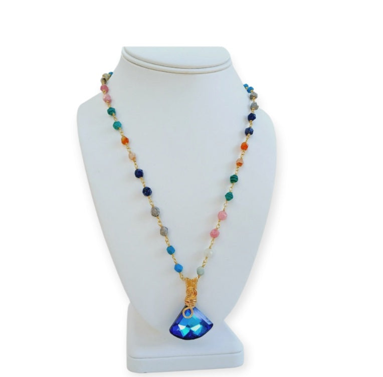 Handmade natural stone necklace featuring Lapis Lazuli, Amazonite, and Magnesite beads, designed for women who love crystal jewelry. This elegant and earthy accessory blends calming blue and turquoise tones, making it a meaningful and stylish gift for her. Crafted with care, each stone is unique, offering beauty and positive energy. Perfect for birthdays, holidays, or everyday wear, this necklace brings balance, charm, and a touch of nature to any outfit.