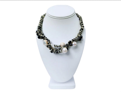 Black & Gold Multi Edison Freshwater Pearl Braided Necklace, a handmade statement jewelry piece for elegant women. Featuring lustrous Edison pearls woven into a black and gold braided cord, this necklace blends luxury with artisanal charm. Perfect for formal events, special occasions, or stylish everyday wear. A thoughtful gift for her, combining timeless beauty with modern craftsmanship in a unique, eye-catching design.