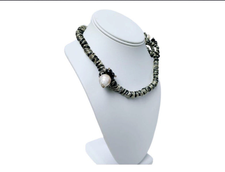 Black & Gold Multi Edison Freshwater Pearl Braided Necklace, a handmade statement jewelry piece for elegant women. Featuring lustrous Edison pearls woven into a black and gold braided cord, this necklace blends luxury with artisanal charm. Perfect for formal events, special occasions, or stylish everyday wear. A thoughtful gift for her, combining timeless beauty with modern craftsmanship in a unique, eye-catching design.