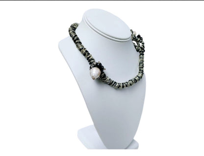 Black & Gold Multi Edison Freshwater Pearl Braided Necklace, a handmade statement jewelry piece for elegant women. Featuring lustrous Edison pearls woven into a black and gold braided cord, this necklace blends luxury with artisanal charm. Perfect for formal events, special occasions, or stylish everyday wear. A thoughtful gift for her, combining timeless beauty with modern craftsmanship in a unique, eye-catching design.