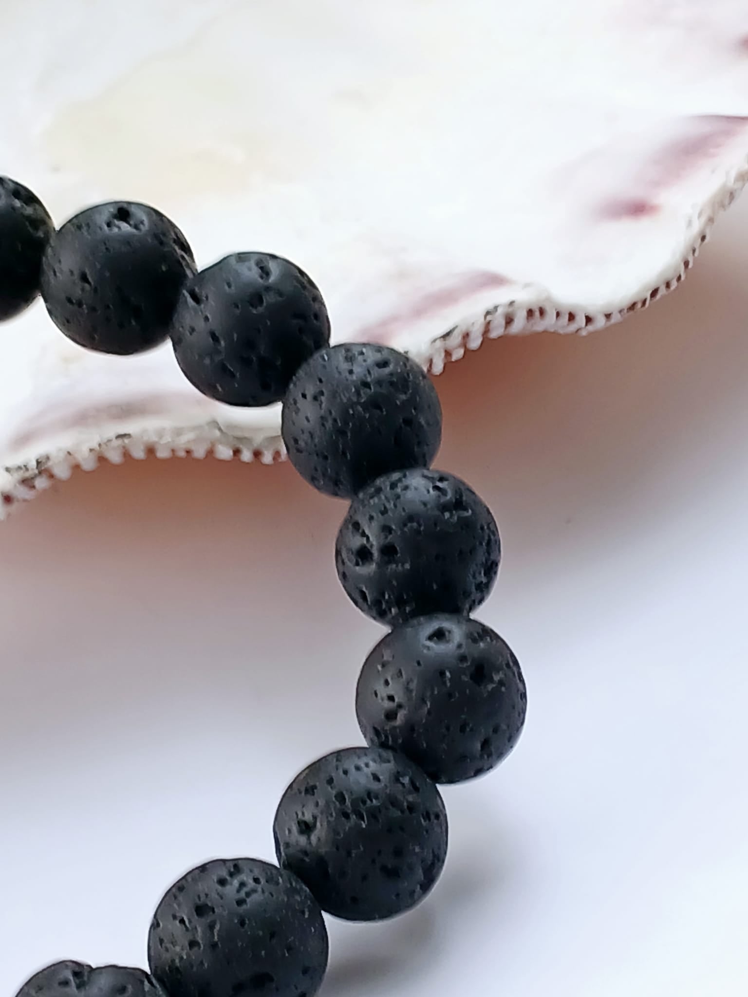 Black lava diffuser bracelet handmade with natural stone beads, designed for both men and women. This stylish aromatherapy accessory allows you to apply essential oils for calming, grounding benefits throughout the day. A thoughtful anniversary gift or wellness-inspired jewelry piece, it combines rugged elegance with holistic function. Perfect for daily wear, stress relief, and a natural touch of style