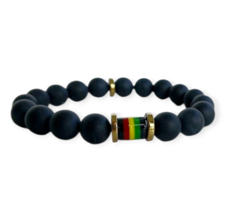 Black Onyx Beaded Rasta Bracelet featuring vibrant reggae colors, handmade with natural gemstone beads for men who love boho and Rastafarian-inspired style. This unisex bracelet symbolizes protection, strength, and cultural pride, making it a meaningful gift for him. Perfect for casual wear, festivals, or spiritual occasions, it blends bold colors with grounding black onyx stones. A stylish accessory that celebrates heritage and positive energy.