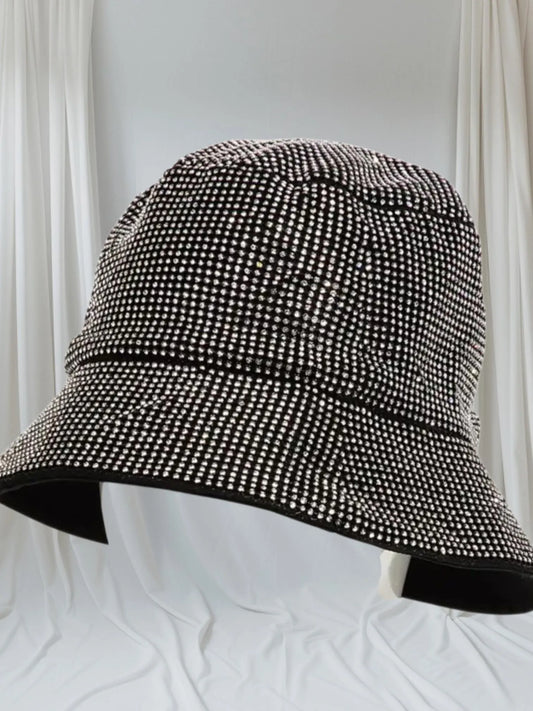 Stylish Rhinestone Bucket Hat designed for men and women, featuring sparkling rhinestones that add glamour and shine to fall and winter outfits. This trendy unisex hat is perfect for festivals, parties, and everyday wear, combining fashion with comfort. Made with quality materials for durability and a comfortable fit, it’s an eye-catching accessory that elevates any casual or festive look. Ideal gift for anyone who loves stylish, statement headwear.