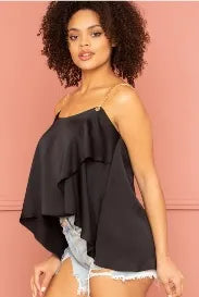 Black satin ruffle layer crop top for women featuring trendy metal chain shoulder straps and a slip-on design for easy wear. This elegant party top combines stylish ruffles with a sleek satin finish, perfect for evening wear and special occasions. The layered detailing adds volume and movement, creating a fashionable and eye-catching look. Ideal for pairing with skirts or pants to complete a chic and sophisticated outfit.