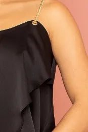 Black satin ruffle layer crop top for women featuring trendy metal chain shoulder straps and a slip-on design for easy wear. This elegant party top combines stylish ruffles with a sleek satin finish, perfect for evening wear and special occasions. The layered detailing adds volume and movement, creating a fashionable and eye-catching look. Ideal for pairing with skirts or pants to complete a chic and sophisticated outfit.