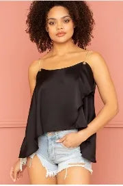 Black satin ruffle layer crop top for women featuring trendy metal chain shoulder straps and a slip-on design for easy wear. This elegant party top combines stylish ruffles with a sleek satin finish, perfect for evening wear and special occasions. The layered detailing adds volume and movement, creating a fashionable and eye-catching look. Ideal for pairing with skirts or pants to complete a chic and sophisticated outfit.