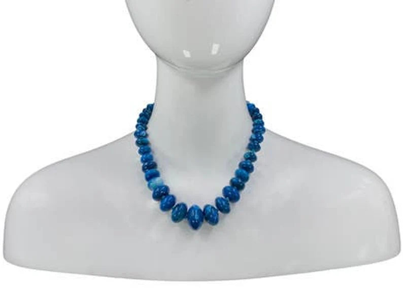 Blue Agate Necklace featuring a natural gemstone known for its spiritual healing properties. This elegant crystal jewelry piece is perfect for women seeking balance and inner peace. The vibrant blue agate pendant adds a calming energy, ideal for daily wear or meditation. Designed for layering or worn as a choker, it’s a meaningful gift for birthdays, wellness lovers, or anyone drawn to the beauty of natural stones.