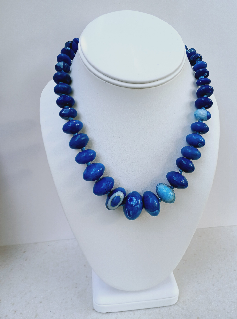 Blue Agate Necklace featuring a natural gemstone known for its spiritual healing properties. This elegant crystal jewelry piece is perfect for women seeking balance and inner peace. The vibrant blue agate pendant adds a calming energy, ideal for daily wear or meditation. Designed for layering or worn as a choker, it’s a meaningful gift for birthdays, wellness lovers, or anyone drawn to the beauty of natural stones.