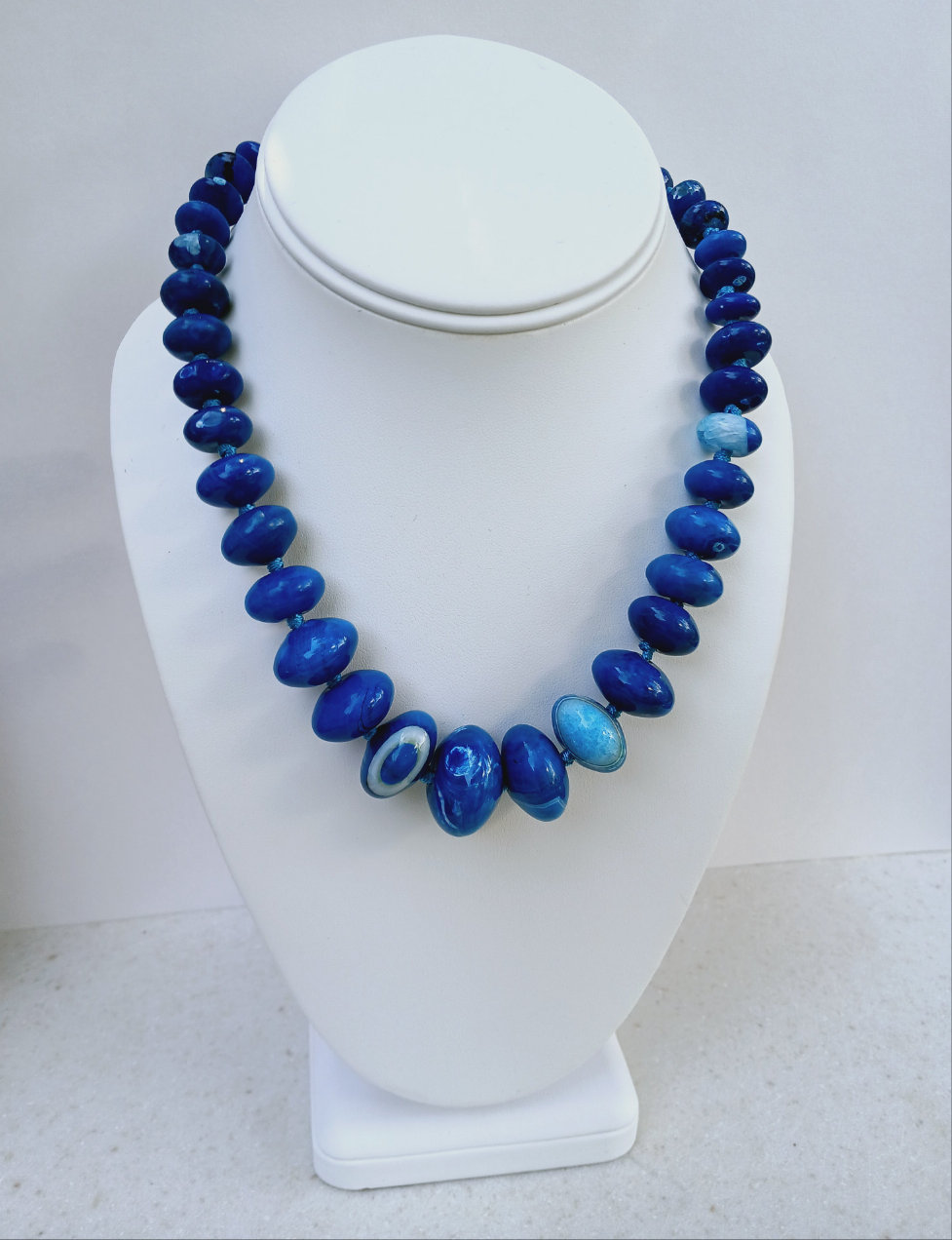 Blue Agate Necklace featuring a natural gemstone known for its spiritual healing properties. This elegant crystal jewelry piece is perfect for women seeking balance and inner peace. The vibrant blue agate pendant adds a calming energy, ideal for daily wear or meditation. Designed for layering or worn as a choker, it’s a meaningful gift for birthdays, wellness lovers, or anyone drawn to the beauty of natural stones.