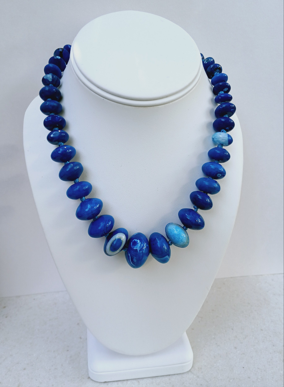 Blue Agate Necklace featuring a natural gemstone known for its spiritual healing properties. This elegant crystal jewelry piece is perfect for women seeking balance and inner peace. The vibrant blue agate pendant adds a calming energy, ideal for daily wear or meditation. Designed for layering or worn as a choker, it’s a meaningful gift for birthdays, wellness lovers, or anyone drawn to the beauty of natural stones.