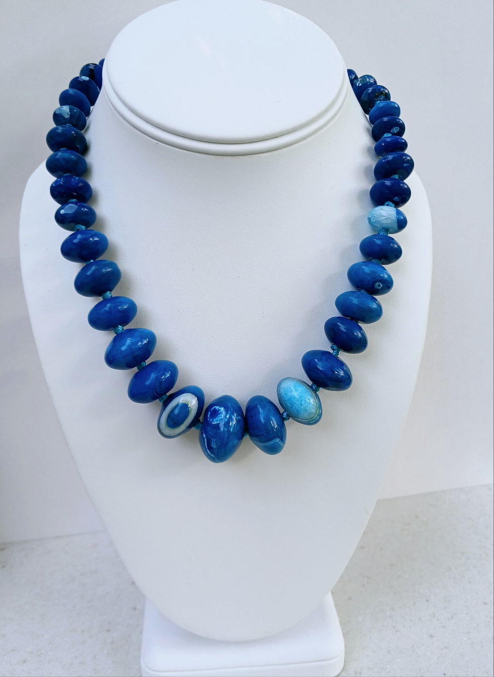 Blue Agate Necklace featuring a natural gemstone known for its spiritual healing properties. This elegant crystal jewelry piece is perfect for women seeking balance and inner peace. The vibrant blue agate pendant adds a calming energy, ideal for daily wear or meditation. Designed for layering or worn as a choker, it’s a meaningful gift for birthdays, wellness lovers, or anyone drawn to the beauty of natural stones.