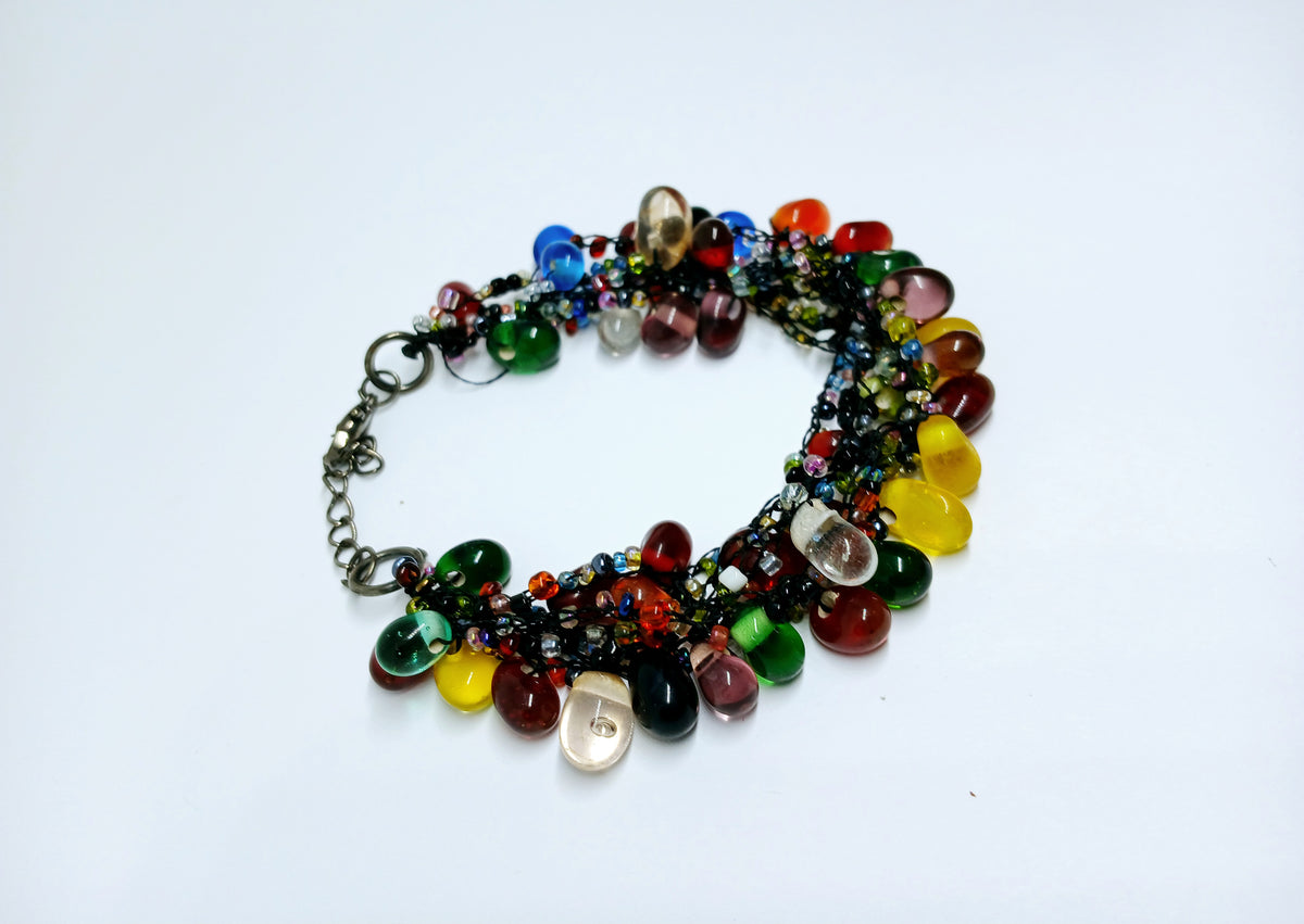 Glass Bead Black Thread Bracelet for Men and Women, featuring an adjustable handmade design perfect for a minimalist boho look. This unisex wristband combines sleek black thread with delicate glass beads for a subtle yet stylish accessory. Ideal as a friendship bracelet or everyday jewelry piece, it offers comfort and versatility. A meaningful handmade gift for anyone who appreciates simple, modern bohemian fashion.