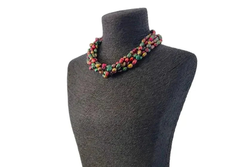 Handmade multi-strand chunky beaded pearl necklace designed as a bold statement choker for women. This retro-inspired accessory features layers of lustrous faux or freshwater pearls, offering a timeless yet eye-catching look. Perfect as a gift for her, it adds elegance and vintage charm to any outfit, ideal for special occasions, parties, or elevating everyday style with handcrafted sophistication and flair.