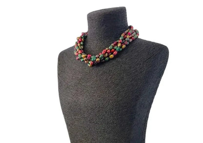 Handmade multi-strand chunky beaded pearl necklace designed as a bold statement choker for women. This retro-inspired accessory features layers of lustrous faux or freshwater pearls, offering a timeless yet eye-catching look. Perfect as a gift for her, it adds elegance and vintage charm to any outfit, ideal for special occasions, parties, or elevating everyday style with handcrafted sophistication and flair.