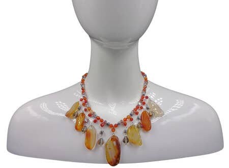 Chunky Agate Necklace featuring vibrant orange carnelian beads crafted into a bold statement crystal choker. This handmade brown jewelry piece combines earthy tones with striking gemstone energy, perfect for women who love unique, artisanal accessories. Lightweight yet eye-catching, it adds warmth and sophistication to any outfit. Ideal as a delicate gift for women who appreciate handcrafted jewelry that blends natural beauty with modern boho style and meaningful crystal healing properties.