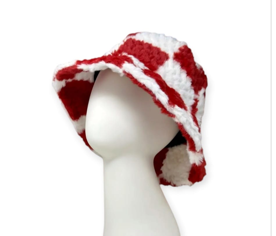 White and Red Checkered Crochet Bucket Hat with soft faux fur, handmade for cozy comfort and standout style during fall and winter. This warm and trendy unisex accessory features a bold checkered pattern and plush texture, perfect for casual wear, cold-weather outings, and fashion-forward looks. Designed for both men and women, it combines vintage crochet charm with modern flair—an ideal gift or statement piece for stylish, chilly-day layering.