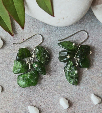 Chromium Diopside Sterling Silver Earrings featuring vibrant green gemstones set in elegant silver settings. These stylish earrings offer a touch of luxury and sophistication, perfect for women who appreciate refined, natural beauty. Ideal as a bridesmaid jewelry gift or a timeless accessory for formal events, these handcrafted earrings blend classic elegance with a modern twist, making them a stunning choice for weddings, special occasions, or everyday elegance.