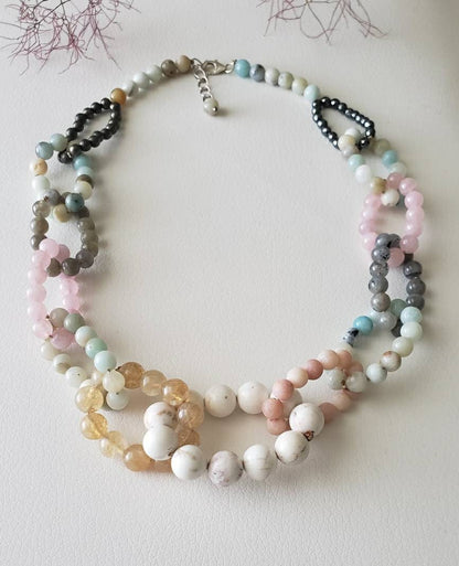 Chunky Multi-Gemstone Necklace for women featuring handcrafted beads of amazonite, rose quartz, hematite, pyrite, and magnesite. This bold statement jewelry piece combines vibrant colors and natural stones to create a unique, eye-catching accessory. Perfect as a birthday gift or special handmade present, it blends spiritual healing properties with artisanal craftsmanship. Ideal for women who love colorful, meaningful jewelry that elevates any outfit with boho-chic elegance.