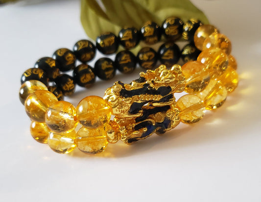 Citrine Obsidian Pixiu bracelet designed for wealth attraction and protection, handcrafted with natural crystals. This Feng Shui-inspired healing jewelry piece combines the powerful energy of citrine and obsidian stones, believed to enhance prosperity, ward off negative energy, and bring balance. Suitable for men and women, it makes a meaningful gift for those seeking spiritual harmony and positive energy in daily life.