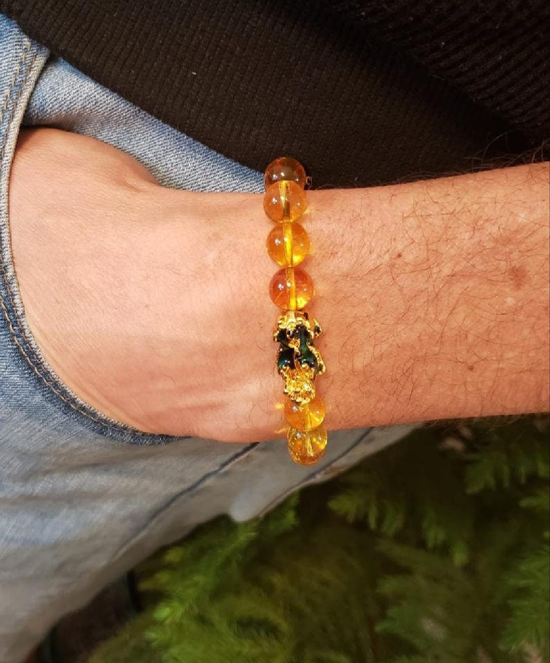 Citrine Obsidian Pixiu bracelet designed for wealth attraction and protection, handcrafted with natural crystals. This Feng Shui-inspired healing jewelry piece combines the powerful energy of citrine and obsidian stones, believed to enhance prosperity, ward off negative energy, and bring balance. Suitable for men and women, it makes a meaningful gift for those seeking spiritual harmony and positive energy in daily life.
