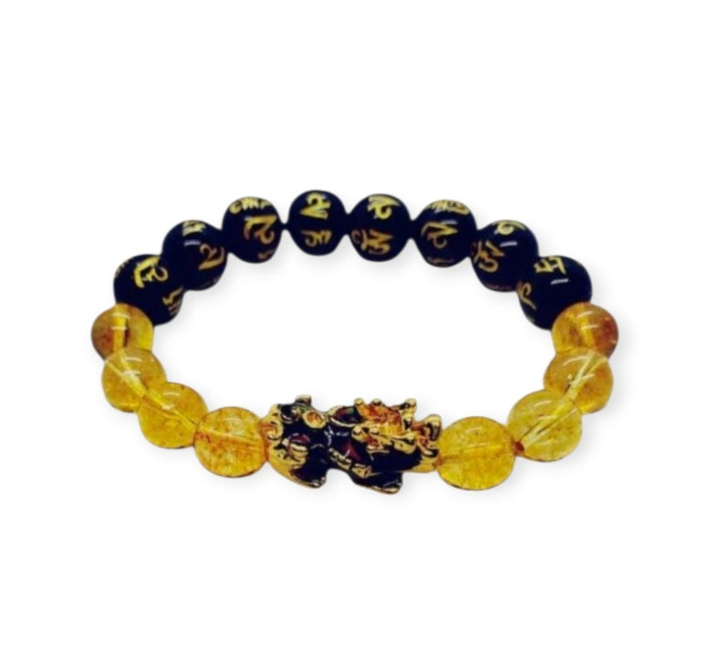 Citrine Obsidian Pixiu bracelet designed for wealth attraction and protection, handcrafted with natural crystals. This Feng Shui-inspired healing jewelry piece combines the powerful energy of citrine and obsidian stones, believed to enhance prosperity, ward off negative energy, and bring balance. Suitable for men and women, it makes a meaningful gift for those seeking spiritual harmony and positive energy in daily life.