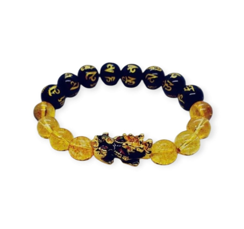 Citrine Obsidian Pixiu bracelet designed for wealth attraction and protection, handcrafted with natural crystals. This Feng Shui-inspired healing jewelry piece combines the powerful energy of citrine and obsidian stones, believed to enhance prosperity, ward off negative energy, and bring balance. Suitable for men and women, it makes a meaningful gift for those seeking spiritual harmony and positive energy in daily life.