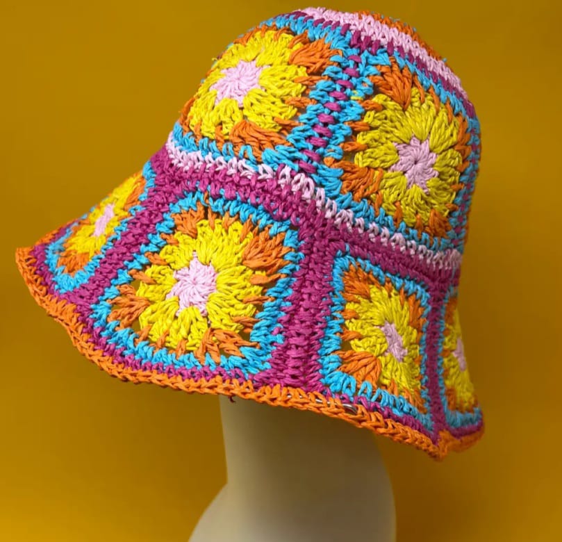 Cottage Summer Sun Hat featuring a multicolor floral yarn crochet design with a wide brim, handcrafted as a foldable bucket fisherman hat for women. Perfect for beach days, travel, and outdoor adventures, this lightweight straw hat offers excellent sun protection and breathable comfort. Combining boho-chic style with practical functionality, it makes a versatile accessory that enhances any summer outfit with vibrant colors and cottagecore charm.