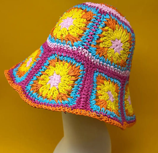 Cottage Summer Sun Hat featuring a multicolor floral yarn crochet design with a wide brim, handcrafted as a foldable bucket fisherman hat for women. Perfect for beach days, travel, and outdoor adventures, this lightweight straw hat offers excellent sun protection and breathable comfort. Combining boho-chic style with practical functionality, it makes a versatile accessory that enhances any summer outfit with vibrant colors and cottagecore charm.