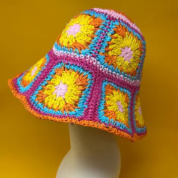 Cottage Summer Sun Hat featuring a multicolor floral yarn crochet design with a wide brim, handcrafted as a foldable bucket fisherman hat for women. Perfect for beach days, travel, and outdoor adventures, this lightweight straw hat offers excellent sun protection and breathable comfort. Combining boho-chic style with practical functionality, it makes a versatile accessory that enhances any summer outfit with vibrant colors and cottagecore charm.