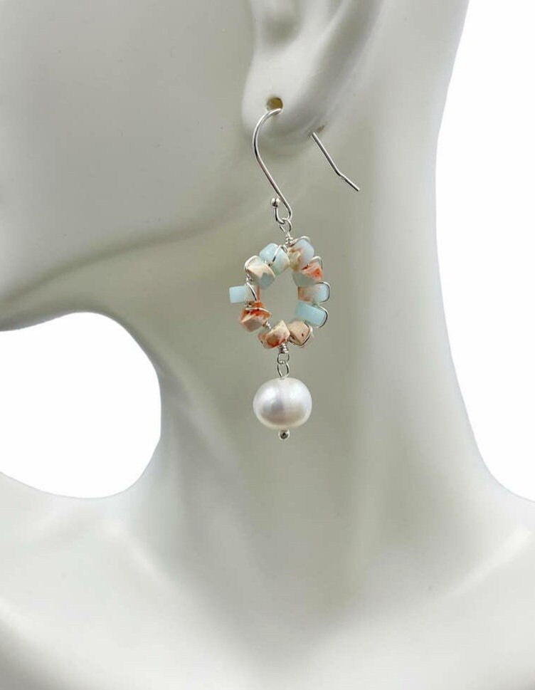 Cultured Pearl Sterling Silver Earrings featuring elegant handmade beadwork, perfect for women who appreciate timeless, sophisticated jewelry. These delicate earrings combine the classic beauty of lustrous pearls with sterling silver craftsmanship, making them an ideal bridesmaid gift or elegant wedding accessory. Lightweight and refined, they add a graceful touch to any bridal or formal outfit, blending artisanal artistry with enduring style for special occasions or everyday elegance.