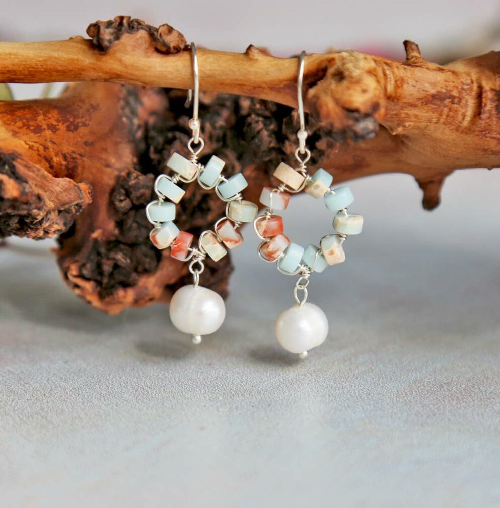 Cultured Pearl Sterling Silver Earrings featuring elegant handmade beadwork, perfect for women who appreciate timeless, sophisticated jewelry. These delicate earrings combine the classic beauty of lustrous pearls with sterling silver craftsmanship, making them an ideal bridesmaid gift or elegant wedding accessory. Lightweight and refined, they add a graceful touch to any bridal or formal outfit, blending artisanal artistry with enduring style for special occasions or everyday elegance.