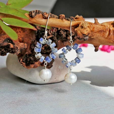 Cultured Pearl Beaded Hoop Earrings for women, featuring natural gemstones including lustrous pearls and vibrant sodalite beads. These handmade boho-style earrings combine elegance and artisanal craftsmanship, perfect as bridesmaid gifts or for everyday wear. Lightweight and eye-catching, they add a sophisticated yet natural touch to any outfit. Ideal for women who love unique, handcrafted jewelry with a blend of classic and bohemian vibes.