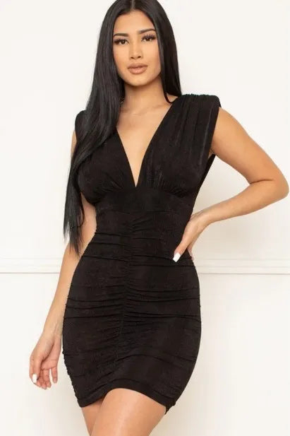 Deep V Neck Shirring Mini Dress in black is a sexy and elegant party dress for women, perfect for summer nights out, clubwear, or special events. Featuring a flattering deep V neckline and stylish shirring details, this mini dress combines boldness with sophistication. Its sleek design enhances the silhouette, making it an ideal choice for confident, fashionable women seeking a chic look for evening occasions.
