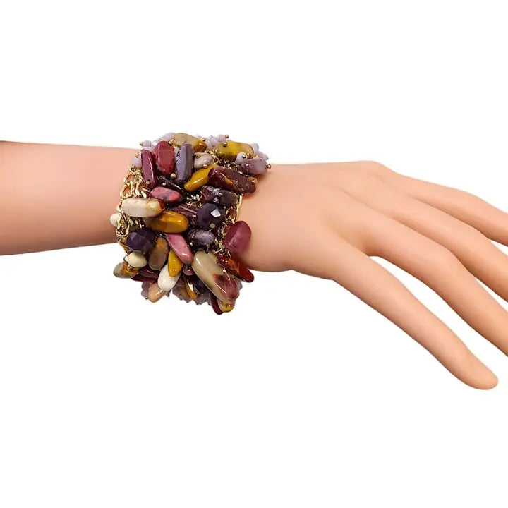 Stone fringe gold chain bracelet for women featuring dainty gemstones and a delicate boho design. Perfect for layering or wearing alone, this minimalist bracelet adds subtle elegance to any outfit. A thoughtful gift for her, it suits both casual and dressy occasions with its lightweight, stylish charm. Ideal for women who love dainty, nature-inspired jewelry, this piece blends bohemian beauty with modern simplicity for everyday wear.