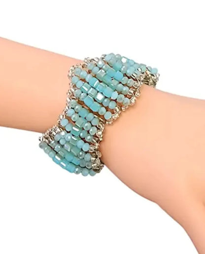 Chunky Turquoise Bracelet for women featuring natural blue-green crystal beads handcrafted into a bold, statement jewelry piece. This handmade turquoise bracelet promotes spiritual healing and positive energy, perfect for those seeking balance and protection. Lightweight yet eye-catching, it makes a meaningful gift for her, blending artisanal craftsmanship with vibrant, earthy tones. Ideal for everyday wear or special occasions to enhance any outfit with boho elegance.