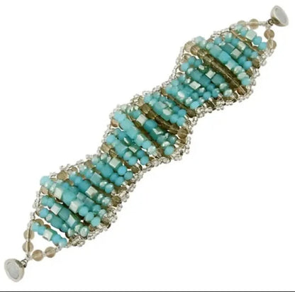 Chunky Turquoise Bracelet for women featuring natural blue-green crystal beads handcrafted into a bold, statement jewelry piece. This handmade turquoise bracelet promotes spiritual healing and positive energy, perfect for those seeking balance and protection. Lightweight yet eye-catching, it makes a meaningful gift for her, blending artisanal craftsmanship with vibrant, earthy tones. Ideal for everyday wear or special occasions to enhance any outfit with boho elegance.