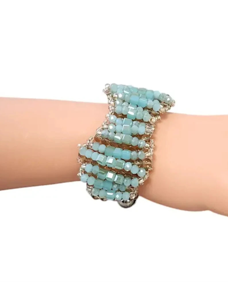 Chunky Turquoise Bracelet for women featuring natural blue-green crystal beads handcrafted into a bold, statement jewelry piece. This handmade turquoise bracelet promotes spiritual healing and positive energy, perfect for those seeking balance and protection. Lightweight yet eye-catching, it makes a meaningful gift for her, blending artisanal craftsmanship with vibrant, earthy tones. Ideal for everyday wear or special occasions to enhance any outfit with boho elegance.
