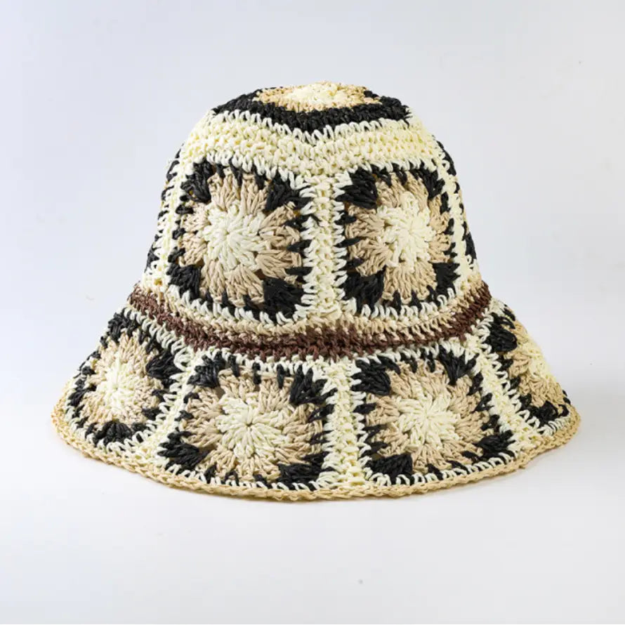 Foldable black crochet bucket hat with wide brim, perfect for summer sun protection and beach outings. This lightweight fisherman-style hat is designed for women who love stylish yet practical travel accessories. Handmade with breathable material, it’s easy to fold and carry, making it an ideal summer accessory for outdoor adventures, vacations, or casual everyday wear with a chic cottage-inspired look.
