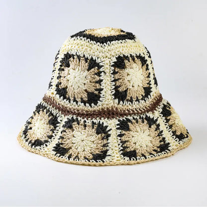Foldable black crochet bucket hat with wide brim, perfect for summer sun protection and beach outings. This lightweight fisherman-style hat is designed for women who love stylish yet practical travel accessories. Handmade with breathable material, it’s easy to fold and carry, making it an ideal summer accessory for outdoor adventures, vacations, or casual everyday wear with a chic cottage-inspired look.