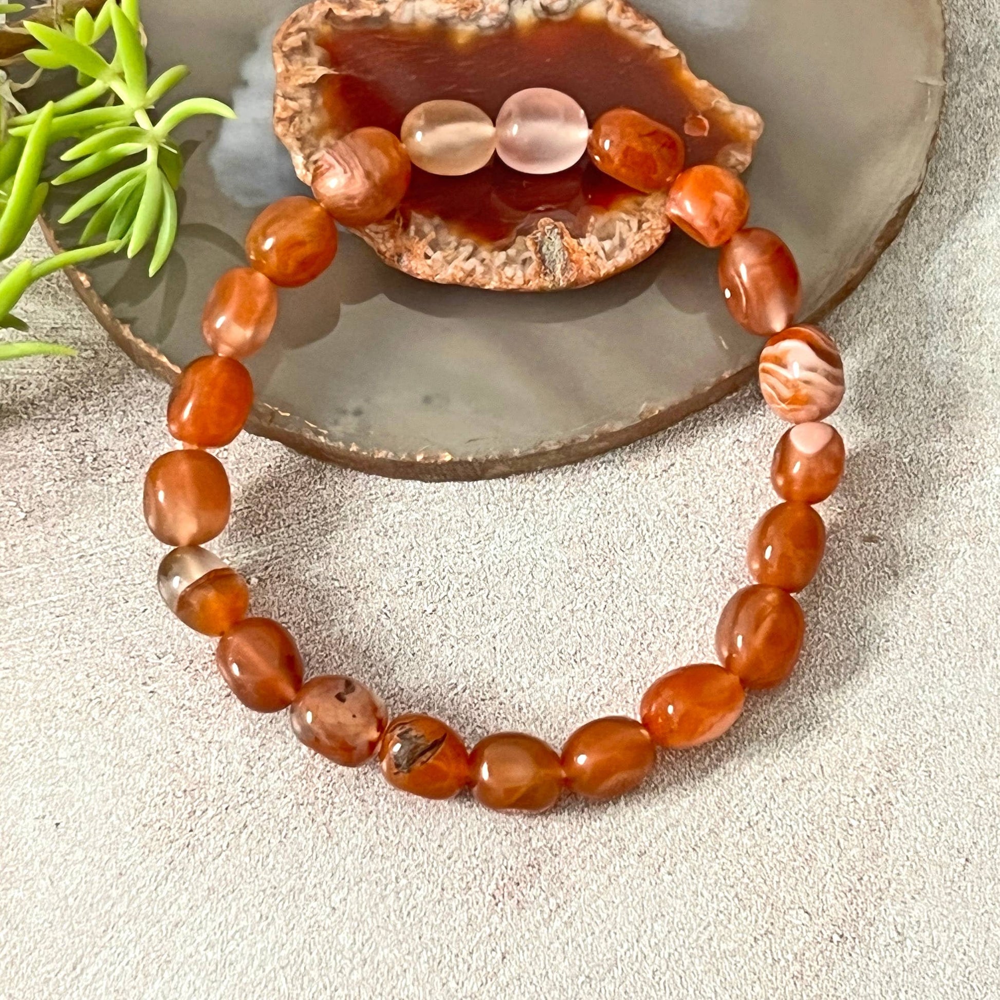 Genuine Red Jade Stretch Bracelet for Women featuring natural red jade beads, handmade with care for durability and comfort. This elegant beaded bracelet is perfect as a healing crystal jewelry piece, known for promoting vitality, courage, and emotional balance. A thoughtful gift for her, ideal for birthdays, anniversaries, or spiritual occasions. Stylish energy bracelet that combines wellness and fashion effortlessly.