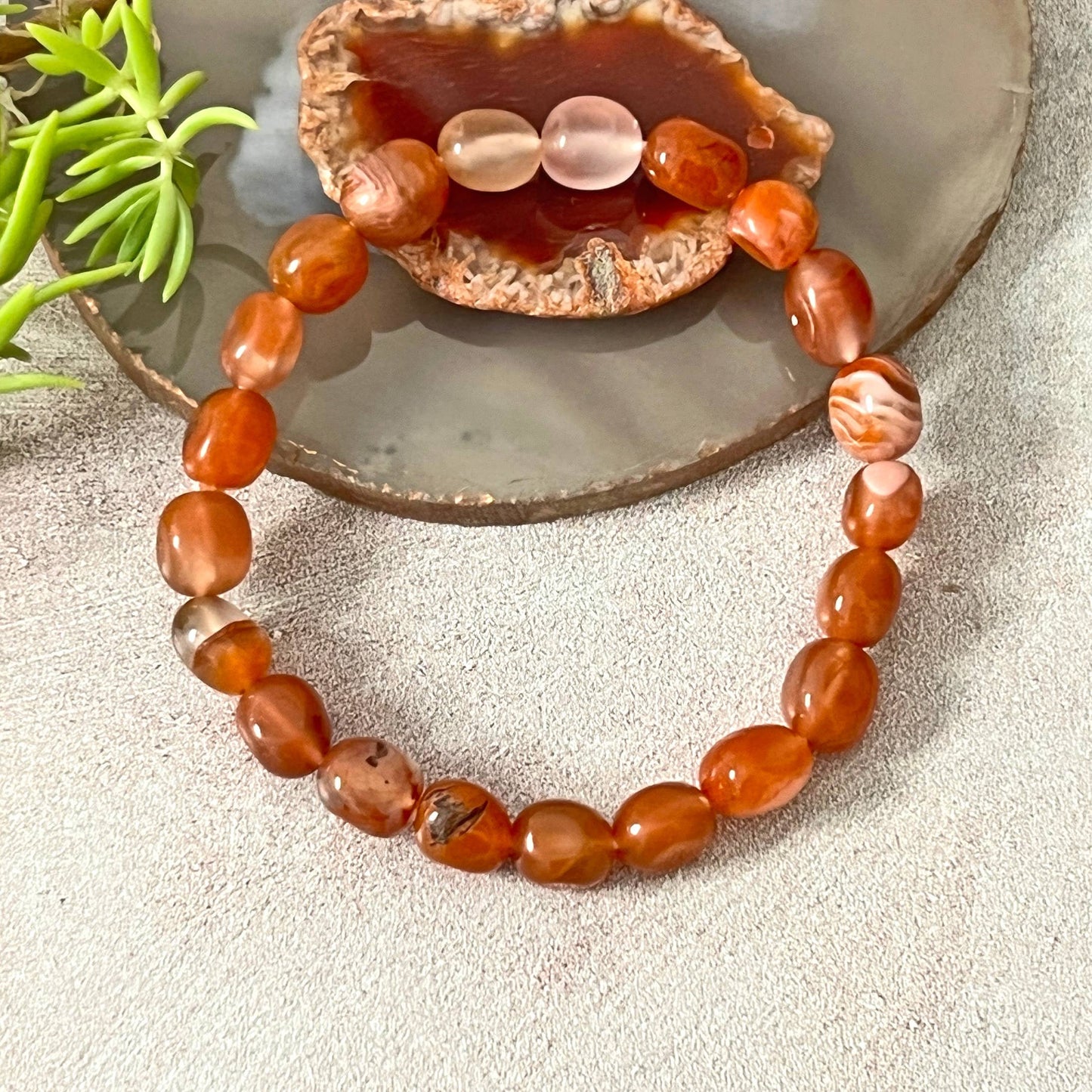 Genuine Red Jade Stretch Bracelet for Women featuring natural red jade beads, handmade with care for durability and comfort. This elegant beaded bracelet is perfect as a healing crystal jewelry piece, known for promoting vitality, courage, and emotional balance. A thoughtful gift for her, ideal for birthdays, anniversaries, or spiritual occasions. Stylish energy bracelet that combines wellness and fashion effortlessly.