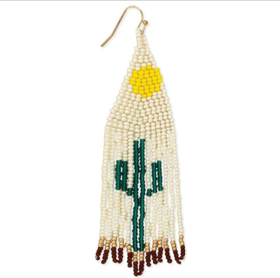 Cactus Earrings featuring Southwest-style glass beadwork with large tassels and fringe design, handmade statement jewelry for women. These colorful earrings showcase intricate bead patterns inspired by desert motifs, perfect for adding bold flair to boho or festival outfits. Lightweight and eye-catching, they make a thoughtful handmade gift for women who love unique, artisanal accessories with southwestern charm and vibrant style.